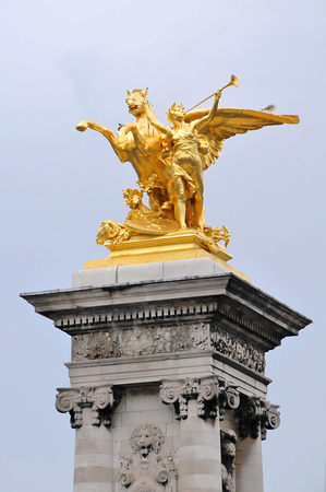 Alexander III Bridge - statue depicting Pegasus being led by Fame (la Renommée).